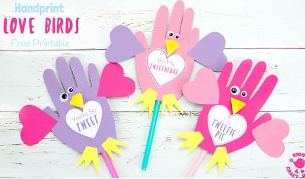 Valentine crafts for preschoolers - sweet lovebird card with handprint body and hearts for wings