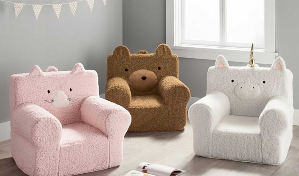 3 kids foam chairs with cute faces- a pink kitten, brown bear, and white unicorn.