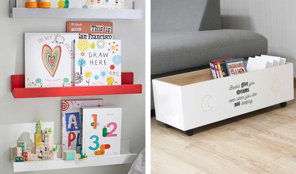 On the left is colorful wall shelves holding children's books; on the right is a wooden rectangular book bin on the floor painted white with the saying 'Books give you dreams even when you are not sleeping.'